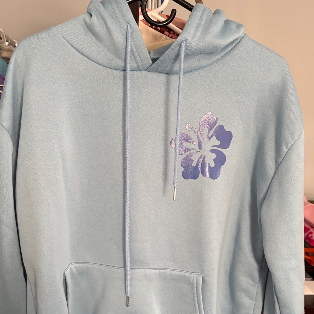 Light Blue Hoodie with Purple Floral Design